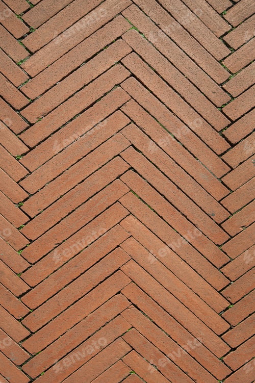 Preview: brick paving with a herringbone pattern, road paved with red bricks, Italy