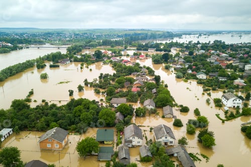 Preview: Aerial view of flooded houses with dirty water of Dnister river in Halych town, western Ukraine.