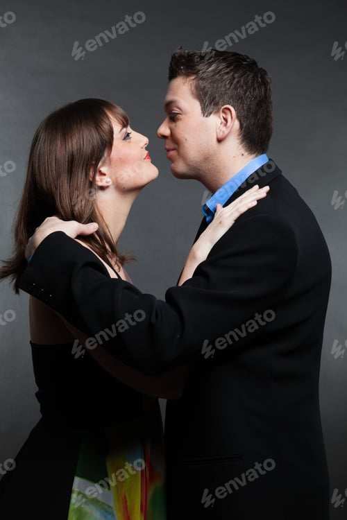 Preview: Romantic Young Couple In Love. Man And Woman. Studio Shot.