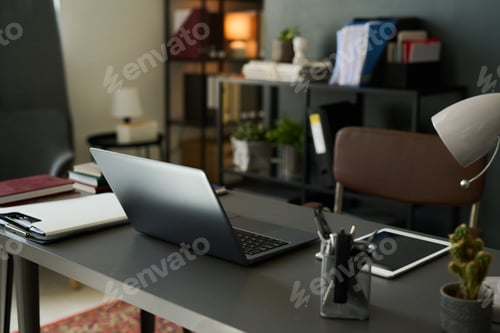 Preview: Working from Modern Home Office with Laptop on Desk