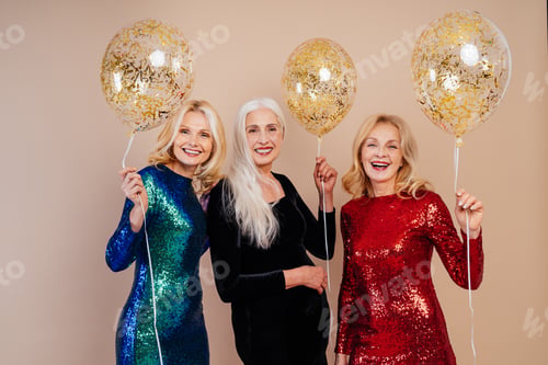 Preview: Happy senior women having party