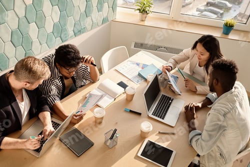 Preview: Businesspeople Having Discussion Meeting at Office Table