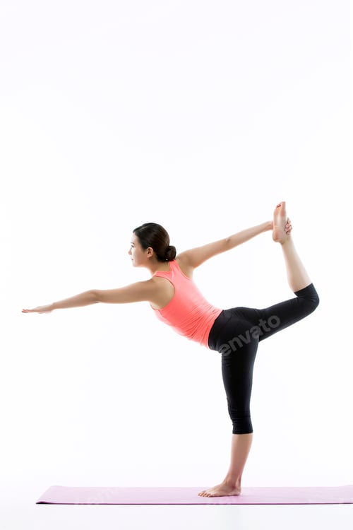 Preview: Young Asian Woman Practicing Yoga on the Mat - Isolated on White
