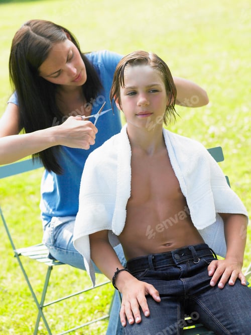 Preview: Boy gets his hair cut by woman