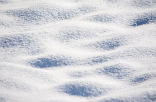 Preview: Closeup shot of snow dunes under the sunlight