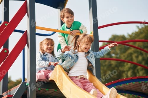 Preview: On the playground. Kids are having fun together