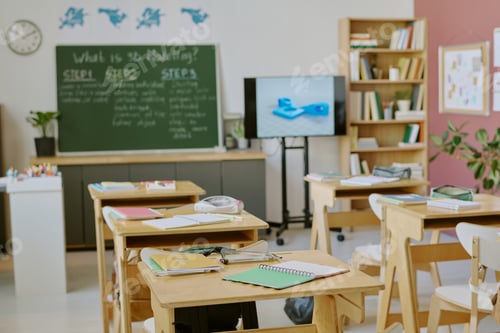 Preview: Empty Classroom with Desks and Chalkboard in School