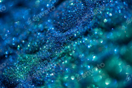 Preview: Abstract glitter lights colorful bokeh background in blue and green color tones