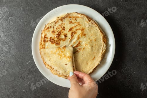 Preview: top view baked delicious pancakes inside white plate on the dark background pancake food meal dish