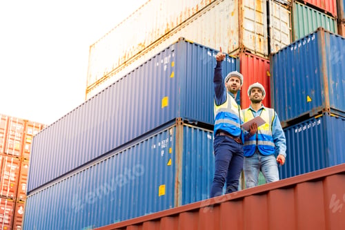 Preview: Two male engineers in a container shipping company Consulting