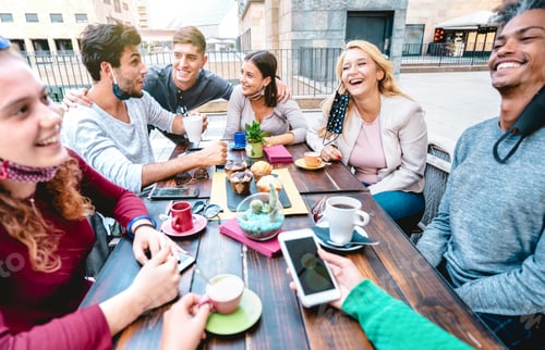 Preview: Friends having fun drinking cappuccino at coffeehouse