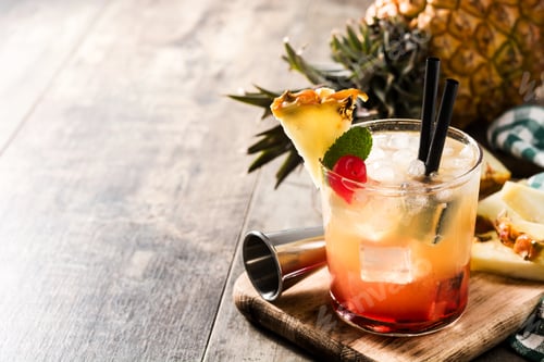 Preview: Cold mai tai cocktail with pineapple and cherry