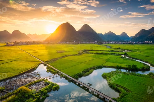 Preview: Sunset over Bac Son Valley with mountain, river and lush green rice field in Vietnam