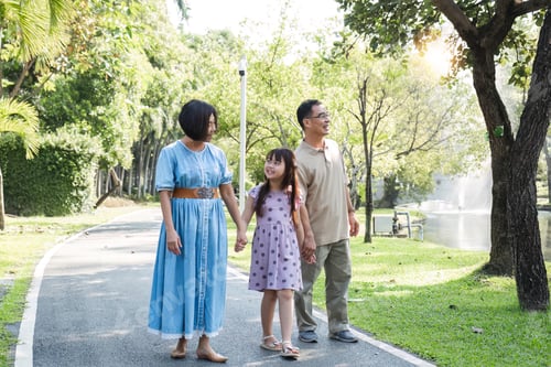 Preview: Kind-hearted Asian senior grandparent Warm and happy enjoying a stroll through the park with their