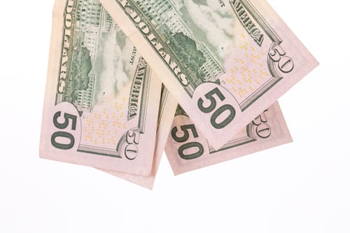 Preview: Close up of different dollar bills.