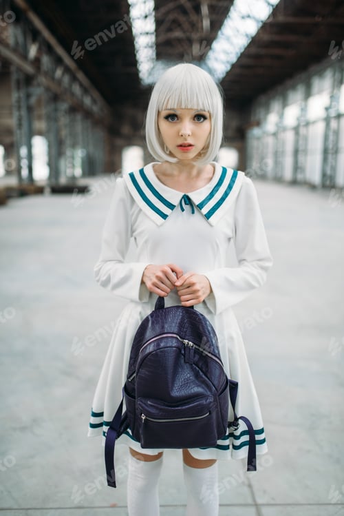 Preview: Anime style blonde girl hugs teddy bear