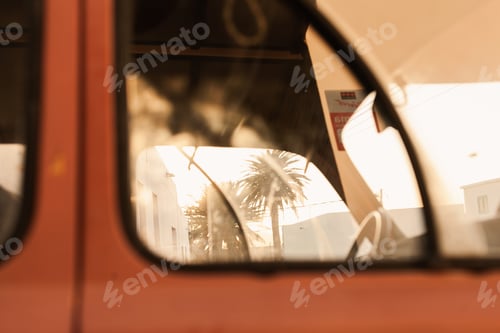 Preview: Retro vintage car window wallpaper. Palm tree through the window.