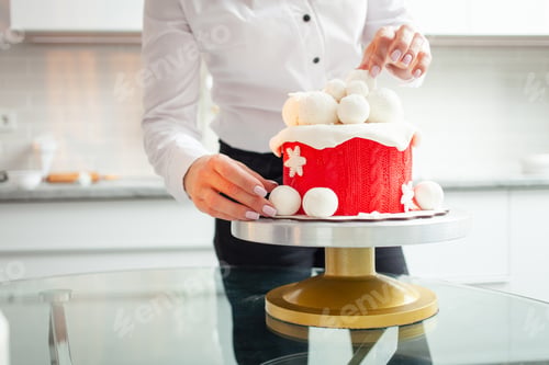 Preview: very beautiful winter cake for Christmas, New Year, holiday, birthday. Pastry chef decorates baking