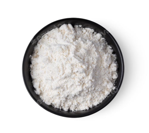 Preview: Pile of flour in black bowl isolated on white background