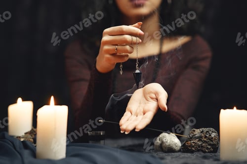 Preview: Portrait of fortune-teller in a dark room