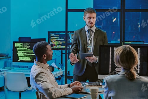 Preview: Cybersecurity Specialist Sharing His Ideas During Meeting In Office