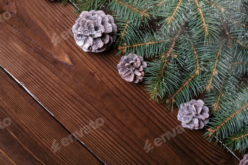 Preview: Christmas Background With Xmas Tree And Sparkle Bokeh Lights On Wooden Canvas Background. Merry
