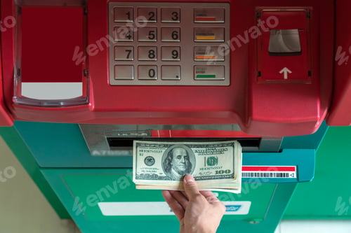 Preview: Top view of Closeup woman withdrawing the cash via ATM, business Automatic Teller Machine