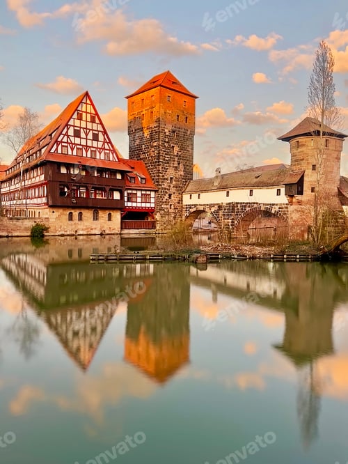 Preview: Symmetrical Reflection of Nurnberg City in Germany, In Spring On Blue Cloudy Sunset Sky Background