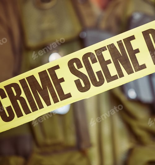 Preview: Youve been warned. Shot of caution tape surrounding a crime scene.