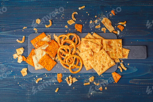 Preview: wide selection of snacks for beer on wooden background