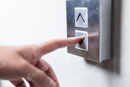 Preview: Pressing elevator button, person selecting floor in modern office building