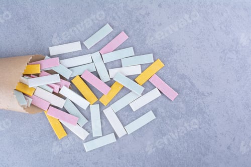 Preview: Colorful Chewing Gum Sticks Spilling Out of a Wrapper
