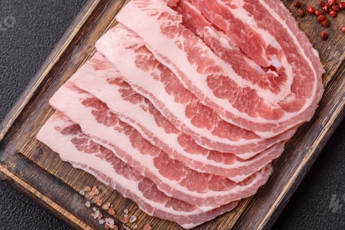 Preview: Fresh raw bacon sliced with spices and herbs