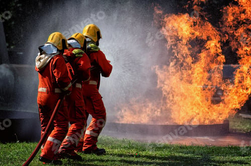 Preview: fire fighter team on training with gas and oil fire hold hose spray jet water spray to extinguish