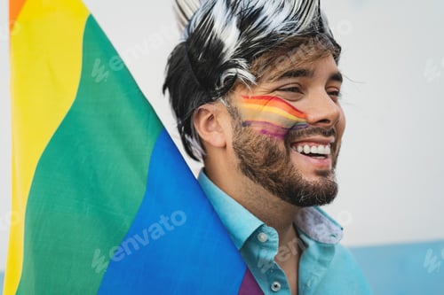 Preview: Happy homosexual man having fun celebrating gay pride festival day