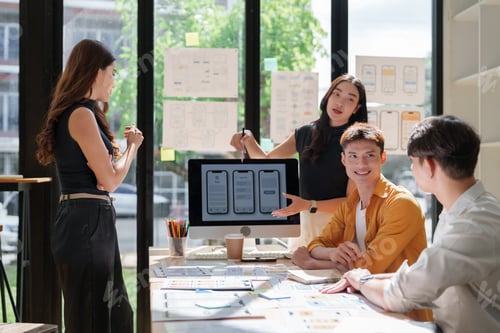 Preview: Design team collaborating on mobile application development