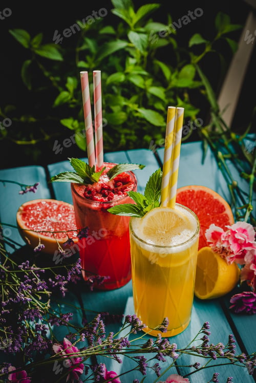Preview: Glasses of refreshing berry and citrus lemonade on a tabletop