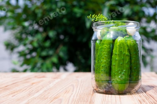 Preview: Pickled Cucumbers in Jar on Wooden Table
