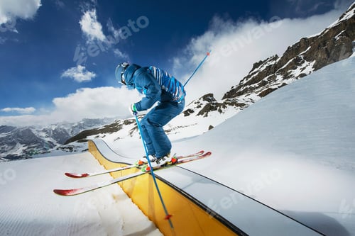 Preview: Male skier standing on ramp getting ready to start
