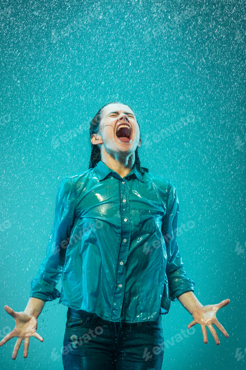 Preview: The Portrait Of Young Beautiful Woman In The Rain