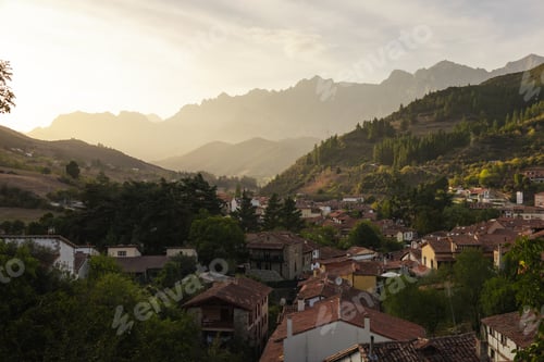 Preview: Small village in mountain valley in a summer evening. Town of Potes, Cantabria, Spain.
