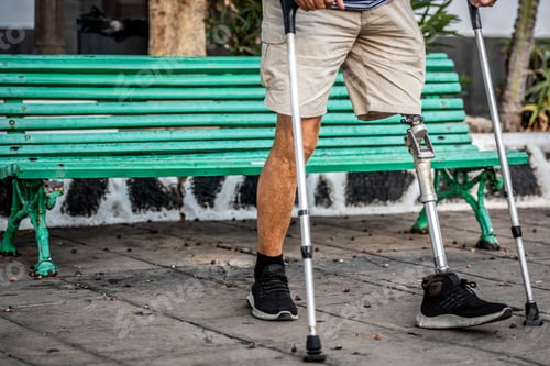 Preview: Man With Prosthetic Leg Walking With Crutches
