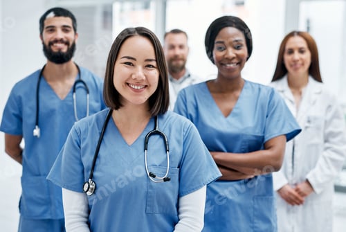 Preview: Portrait of a group of medical practitioners standing together in a hospital