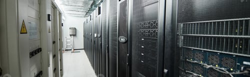 Preview: Rows of server racks highlight advanced computer systems supporting cloud services, banner
