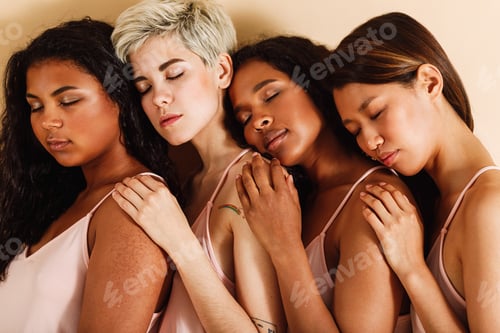 Preview: Group of diverse women standing together with eyes closed