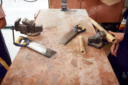 Preview: Close Up Of Tools On Workbench In Workshop Assembling Hand Built Sustainable Bamboo Bicycle Frames
