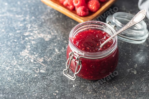 Preview: Red rasberries jam in jar.