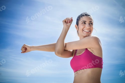 Preview: Woman doing arm stretching exercise