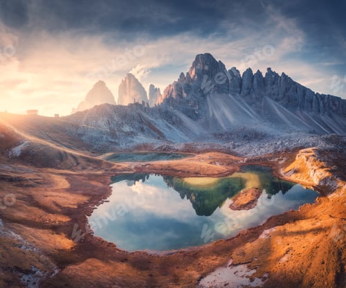 Preview: Aerial view of rocks, mountain lake, reflection in water