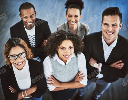 Preview: High angle shot of a group of businesspeople standing together in an office